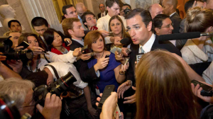 Reporters surround Sen. Ted Cruz in the Capitol. | NPR